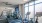 Large fitness center with cardio and weight lifting equipment.